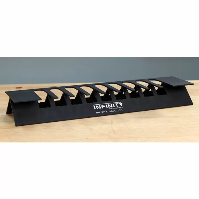 Black woodworking jig for dovetail joinery on a wooden workbench