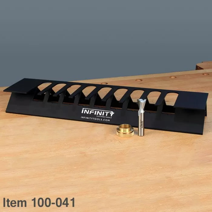 Dovetail jig set with router bit and guide bushing on a woodworking bench