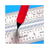 Red pen marking precise measurement on metal woodworking ruler with clear scale markings