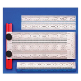 Set of precision stainless steel woodworking rulers and marking gauge on blue background