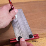6-inch T-rule marking precise lines on a wooden board for woodworking measurements.