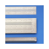 Set of precision stainless steel woodworking rulers on blue background