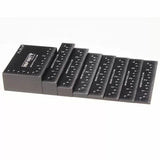 Set of black precision woodworking setup blocks with inch markings, arranged in a row
