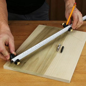 Woodworker using a precision measuring tool and pencil to draw an arc on a wood board