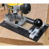 Plunge router with CRB7 jig attached on wood, precision woodworking tool setup