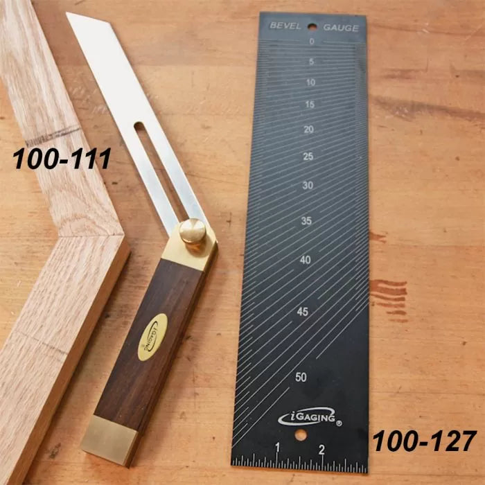 Woodworking bevel gauge, black bevel gauge ruler, and mitered wood on workbench