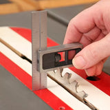 Person using a measuring gauge to check table saw blade height for woodworking accuracy