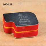 1/16 inch mag shims stack for woodworking on a workbench surface