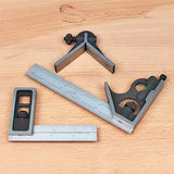 Set of precision woodworking squares and combination ruler on workbench surface