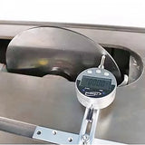 Digital dial indicator measuring alignment of table saw blade