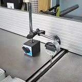 Digital dial indicator with magnetic base measuring table saw alignment in a woodworking shop