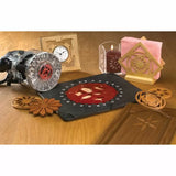 Wood router with template, decorative wood inlays, and finished woodworking projects on table