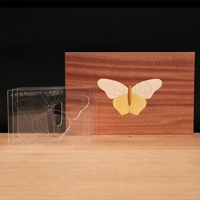 Butterfly inlay template set with wooden butterfly inlay on display block, woodworking tool