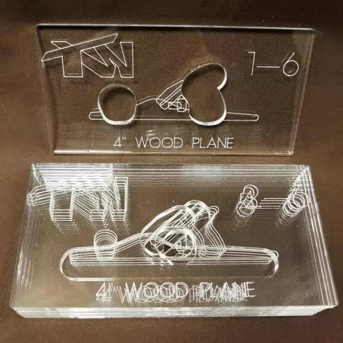 Acrylic 4-inch wood plane jigs for woodworking with engraved design and hand grip cutouts.