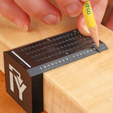 Woodworker using a precision marking gauge to mark measurements on wood