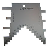 Metal woodworking setup gauge with stair-step notches and engraved inch measurements