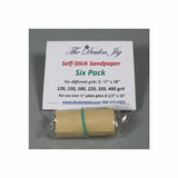 Pack of self-stick sandpaper rolls with assorted grits for woodworking tools, six pack