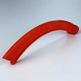 Curved orange plastic push stick for woodworking safety on white background