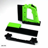 Green and black woodworking jig handle set with ruler and adjustable components on white background