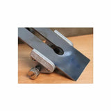 Honing guide tool for sharpening woodworking plane blades on a wooden surface