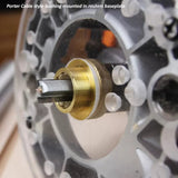 Porter Cable style brass router bushing mounted in router baseplate with straight bit