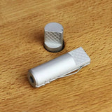 Aluminum bench dog set for woodworking workbench on wood surface