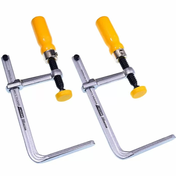 Pair of heavy-duty F-style woodworking clamps with yellow handles on white background