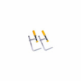 Pair of woodworking table clamps with yellow handles and metal bodies on white background.