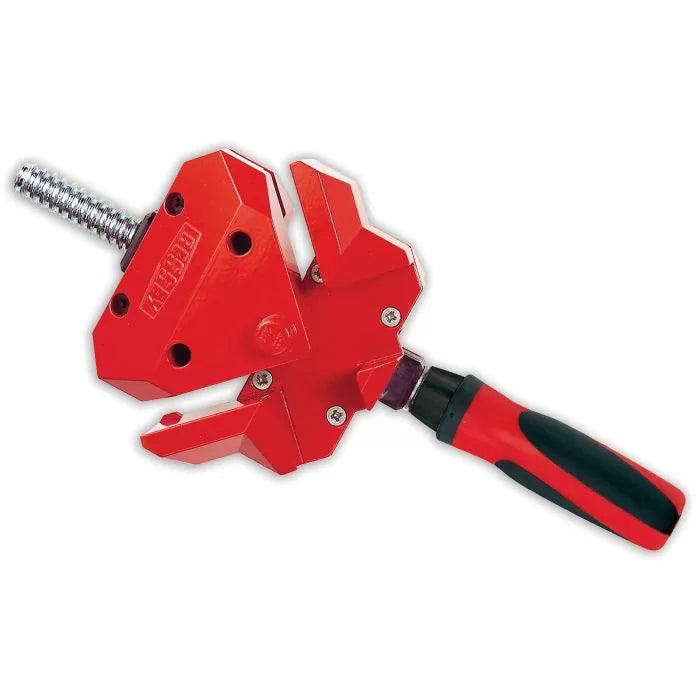 Red woodworking corner clamp with adjustable handle and metal screw, isolated on white
