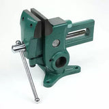 Heavy-duty metal bench vise with green finish on a white background