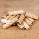 Wooden dowels on a wooden surface