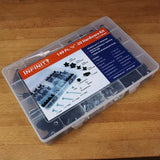 149-piece hardware kit with bolts, knobs, and fasteners in a clear plastic organizer on a wood surface