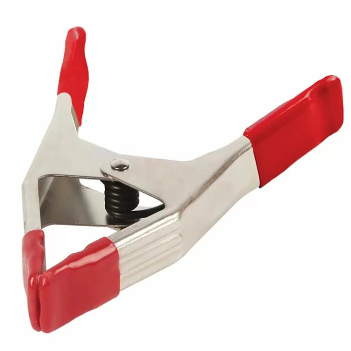 Metal spring clamp with red vinyl grips and jaws, woodworking hand tool