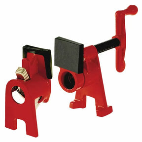 Red woodworking pipe clamp set with metal jaws and handle, ideal for secure clamping tasks.