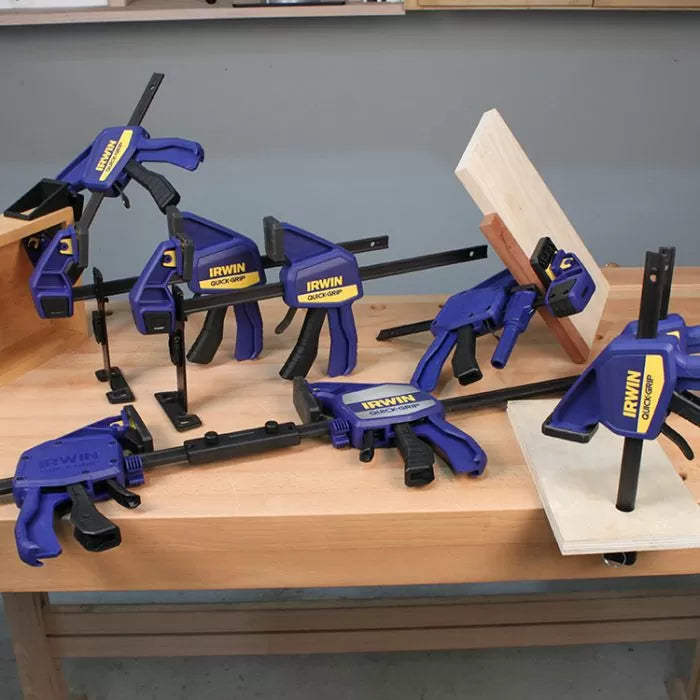 Set of Irwin clamps on a wooden workbench