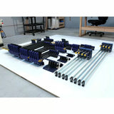 Assorted woodworking bar clamps and pipe clamps neatly arranged on a workshop floor
