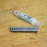 Mini V-DrillGuide drilling guide and storage case on a woodworking table
