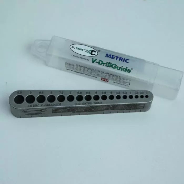 Metric V-DrillGuide metal drill guide with multiple hole sizes and a clear storage case