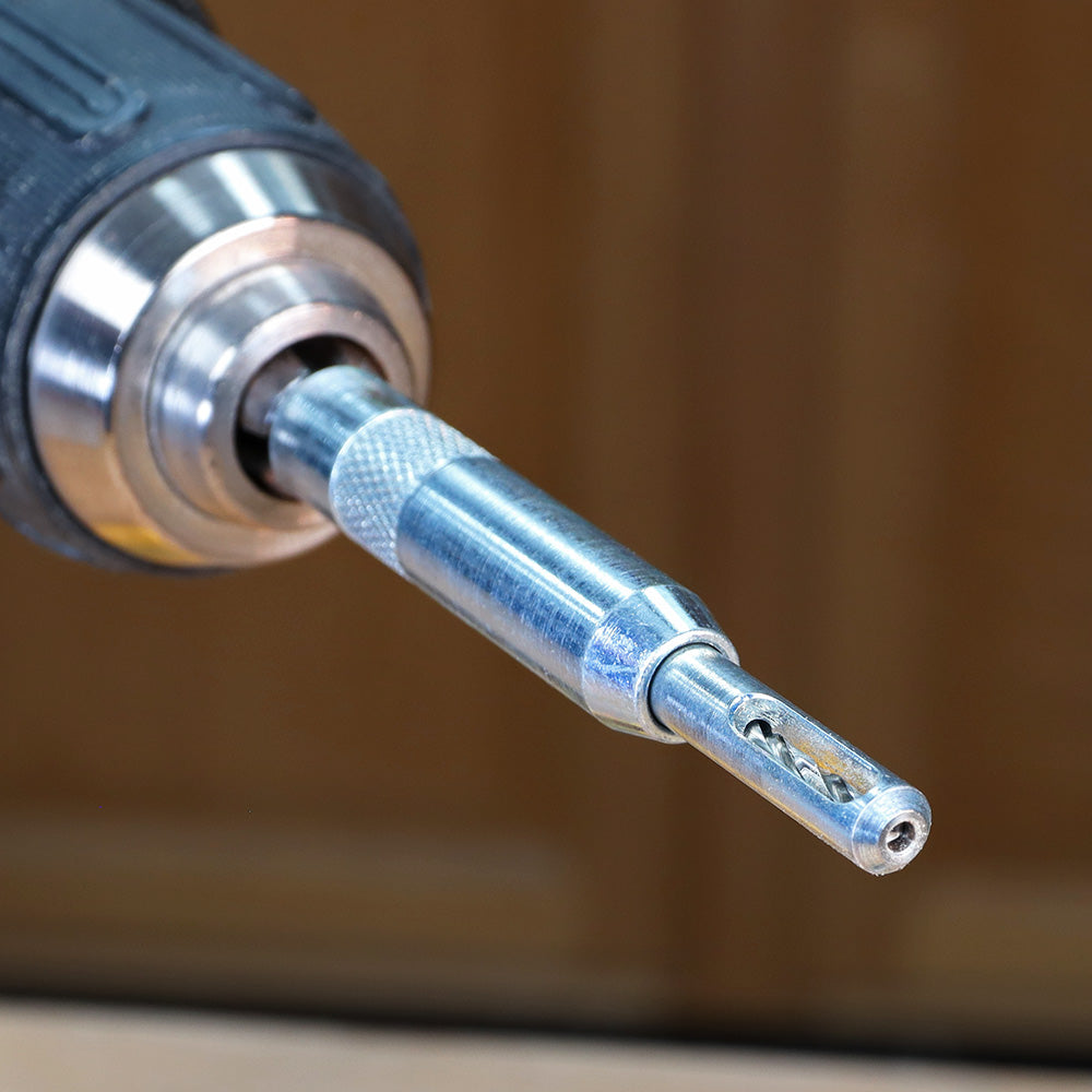Close-up of woodworking drill bit countersink in power drill, ideal for precise wood drilling