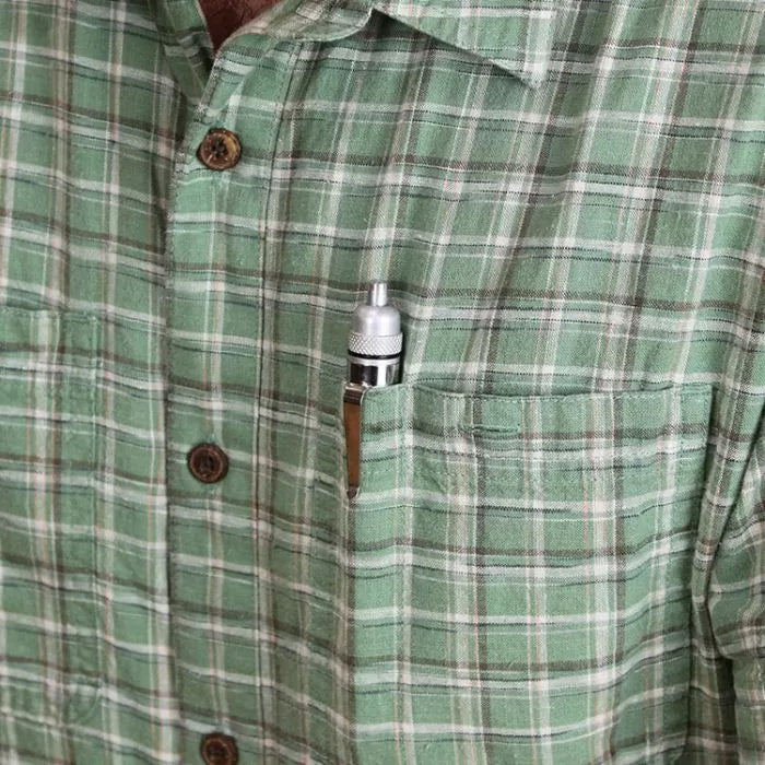 Precision woodworking marking tool clipped in the pocket of a green plaid shirt