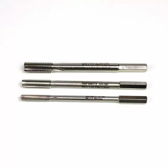 Set of three high speed steel thread hand taps for woodworking and metalworking on white background