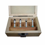 Woodworking router bit set in wooden case, four precision metal bits for cutting and shaping wood