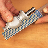 Sharpening a router bit on a diamond honing stone for woodworking tools