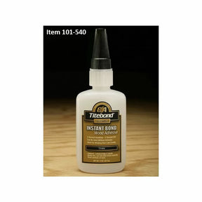 Titebond CA Instant Bond wood adhesive bottle on a wood surface, item 101-540