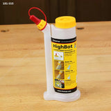 HighBot woodworking glue bottle with precision tips on a wood workbench