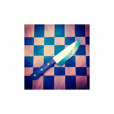Chef knife with wooden handle on checkered wood cutting board
