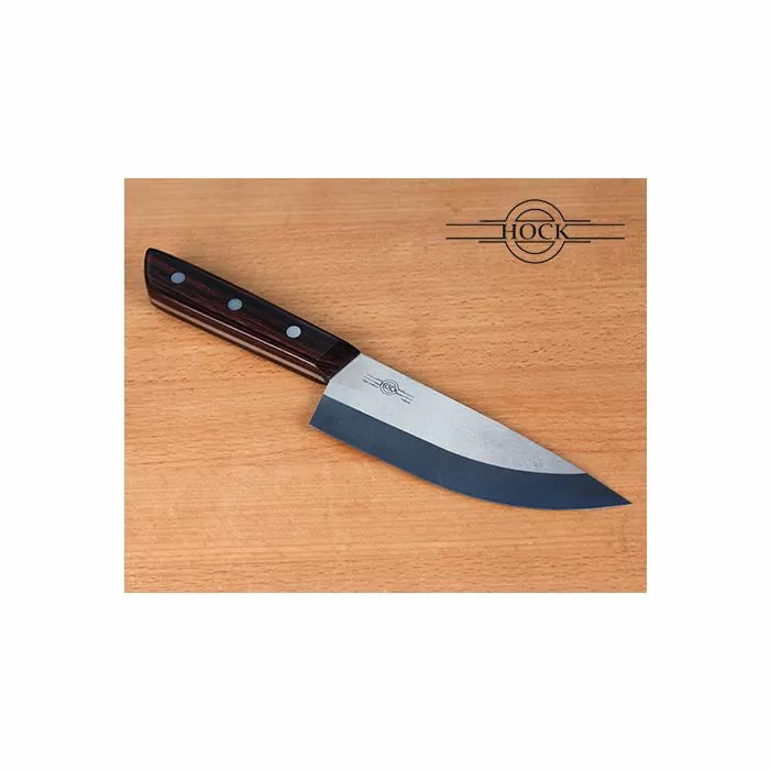 Precision woodworking knife with wooden handle and steel blade on a wood surface