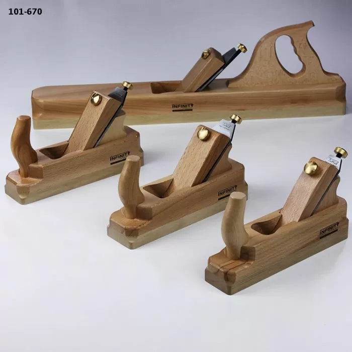Set of wooden hand planes for woodworking on a white background