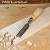 1 inch bevel edge chisel on a wooden workbench with dovetail joints and wood shavings