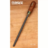 Round wood rasp with wooden handle for woodworking on a light wood surface.